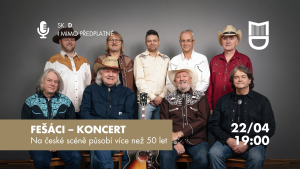 skupina hrající na koncertě